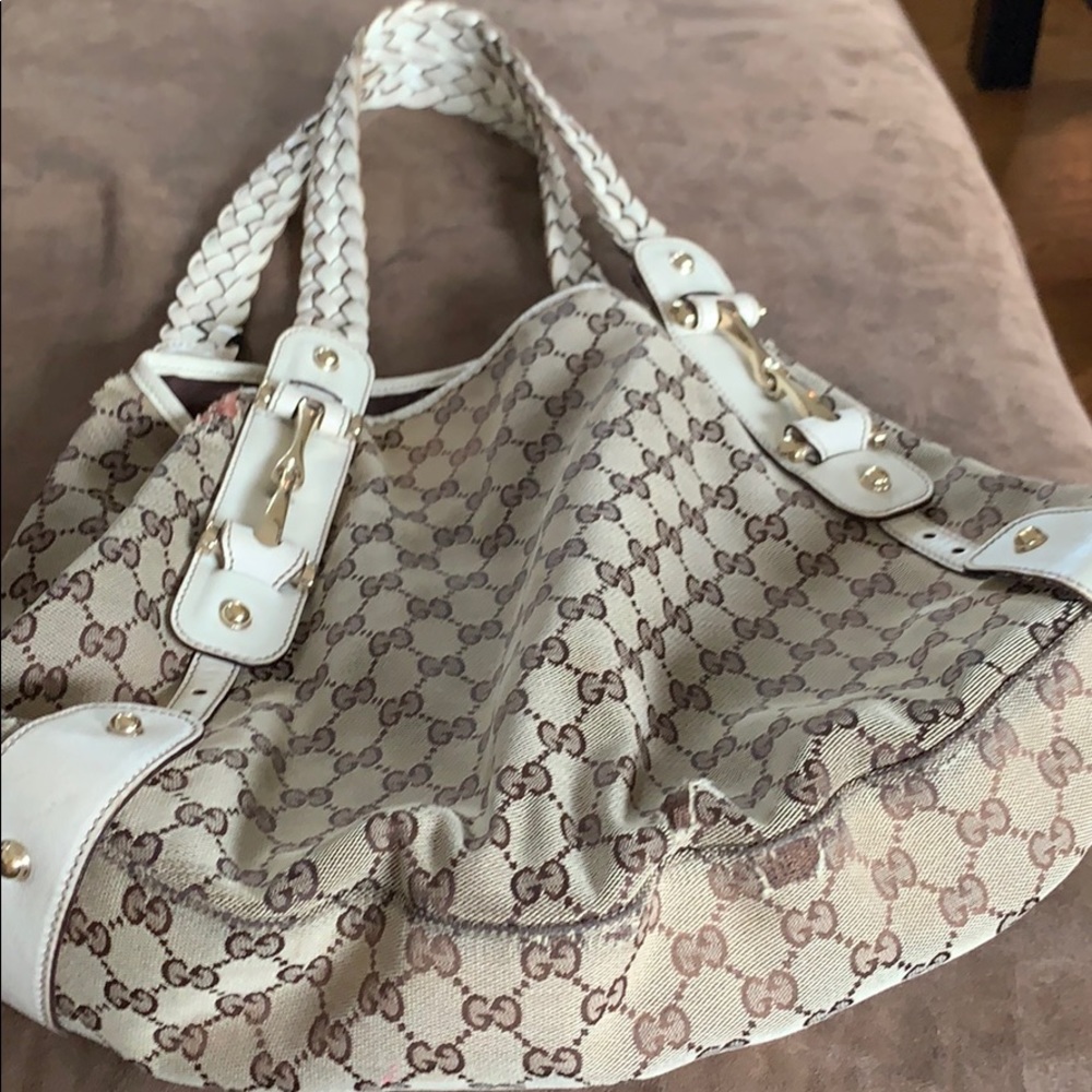 Gucci Pelham leather and. Monogram canvas